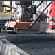 Asphalt Paver Applying Asphalt on the Way - VideoHive Item for Sale