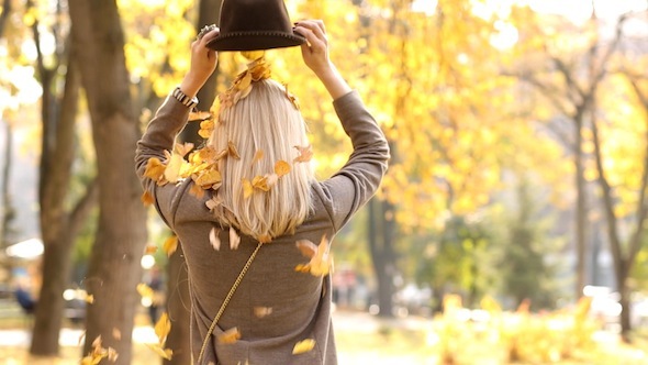 Woman Under The Autumn Leaves