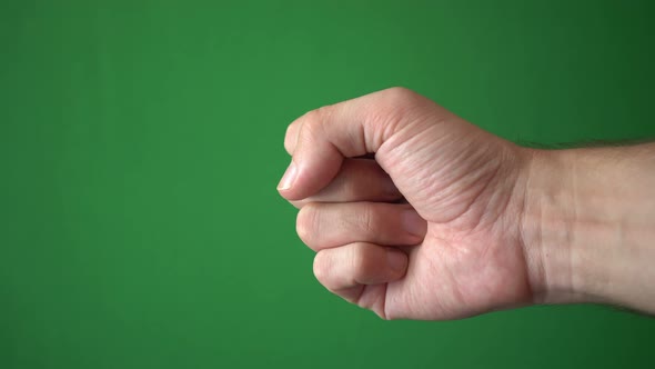 Close Up Hand Of Man Gesture Isolated On Chroma Key Green Screen Background alt
