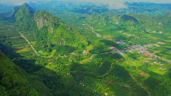 An aerial view from a drone flying over "Khao Thalu" alt