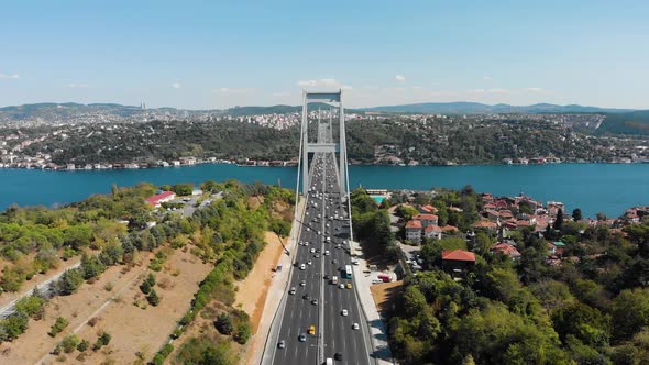 Aerial view of Fatih Sultan Mehmet Bridge and car traffic