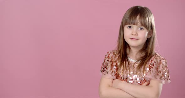 Close Up Shot of Beautiful Blonde Caucasian Little Girl Wearing Sequin Dress alt