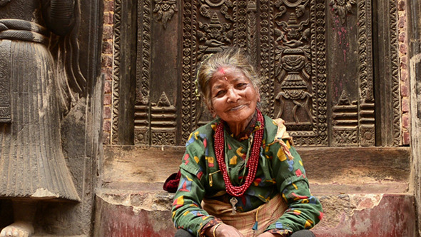 Old Woman On Steps Of Temple alt