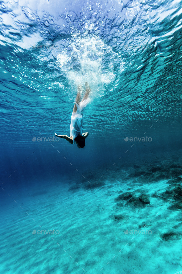 Dancing underwater - Stock Photo - Images