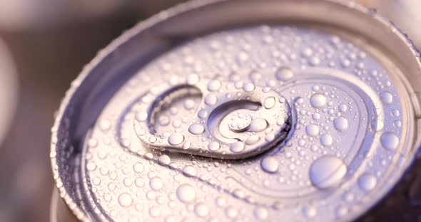 Water droplets on can of soda or beer alt