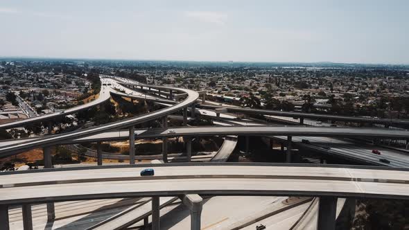Drone Flying Right Over Multiple Levels of Epic Highway Junction Intersection in Los Angeles with alt