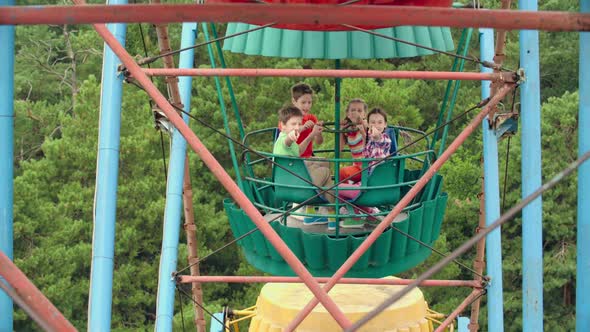 Enjoying Ferris Wheel Ride Enjoying Ferris Wheel Ride
