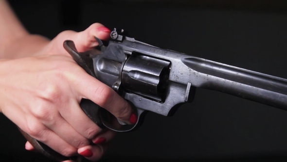 Woman Hand Reloads Revolver