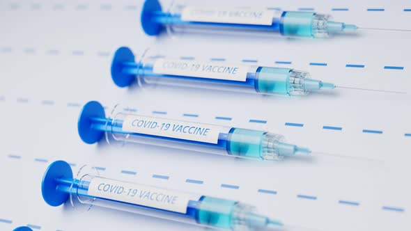 Syringes with a cure ready to inject. Covid vaccine. Vaccination. Inoculation. alt