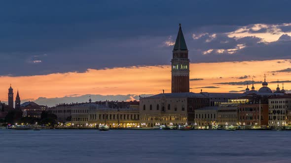View of the Doge's Palace and the Campanile of St. Mark's Cathedral Day To Night Timelapse. Venice alt