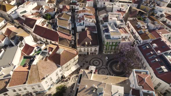 Overhead aerial top down view traditional square with narrow streets in Lagos, Algarve alt