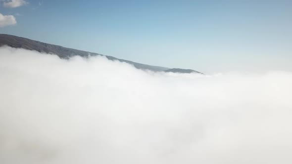 Aerial drone flight through the clouds / 19 Full Hd
