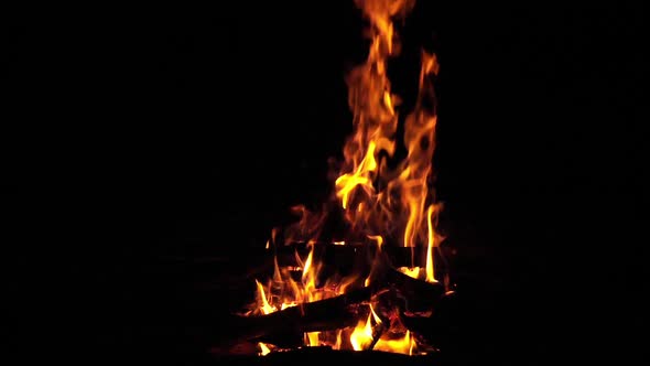 Bonefire, Fire flames in campfire, campsite at Masai Mara Park, Kenya, slow motion alt