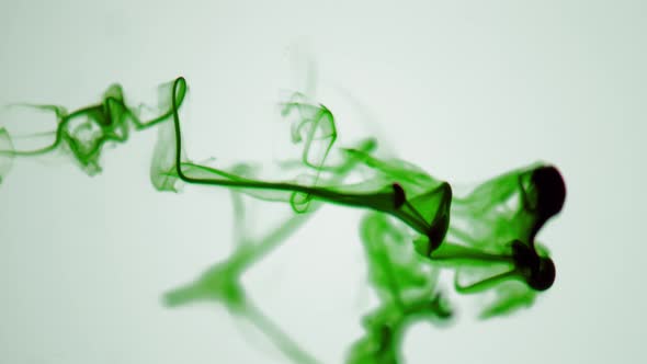 Isolated green Violet Ink Cloud in Macro Close-Up