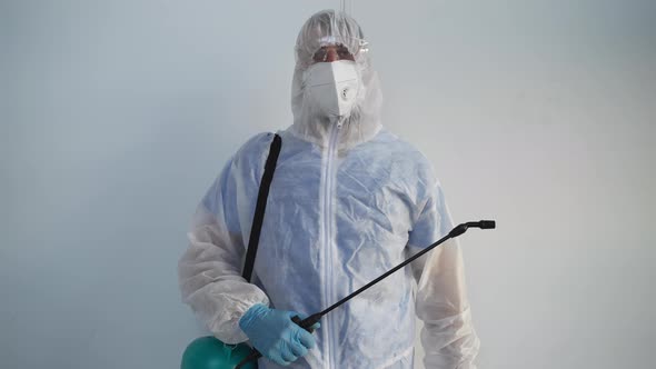 Person is Dressed Hazmat Suit and Mask for Protection From Chemicals alt