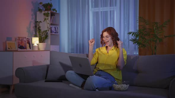 Emotional Girl is Excited Watching Lottery or Sports Match and Happily Reacts to Good News on alt