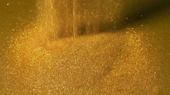 Gold Dust Is Poured Into Pile alt