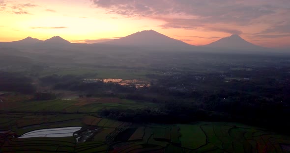 Drone view of four mountains (telomoyo, andong, merbabu and merapi). volcano in sunrise sky. Mountai alt