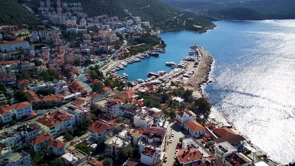 The top view from the drone of Kas resorts, bay, yahts, city in Mugla in Turkey alt