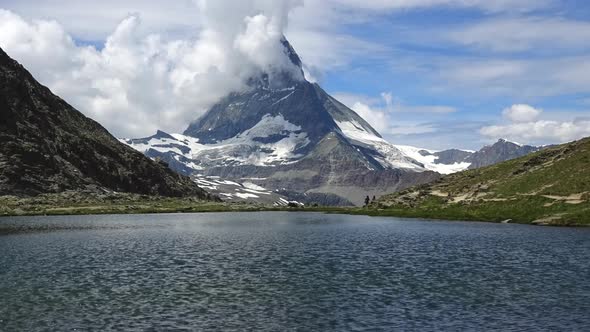 Time lapse view on Matterhorn peak and lake Stellisee, Swiss Alps, Zermatt
