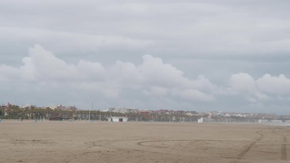 Panorama of City Beach in Valencia and Rough Sea Spain