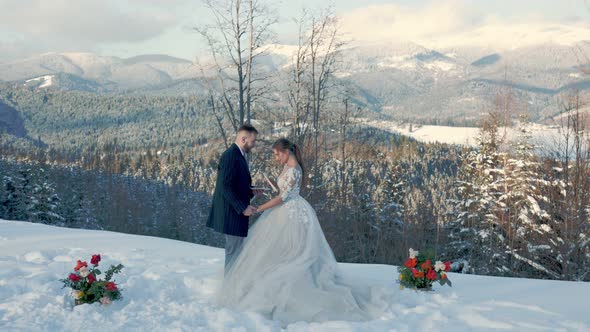 Couple in Winter on the Mountain alt