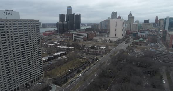 Aerial view of downtown Detroit and surrounding neighborhood on a cloudy and gloomy day. This video alt