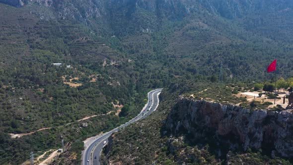 Flying high above the highway that cuts through the mountains near Nicosia alt