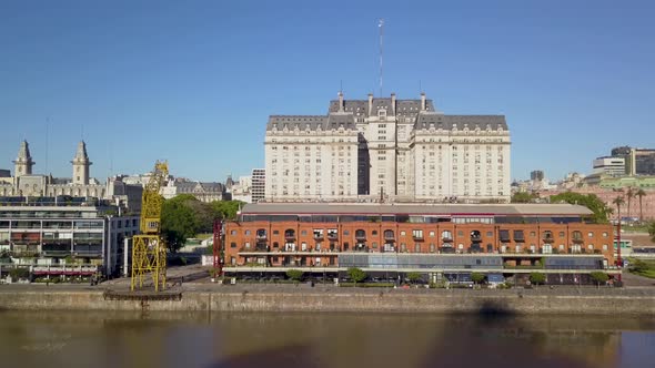Aerial of an original warehouse of Puerto Madero and Libertador building on background alt