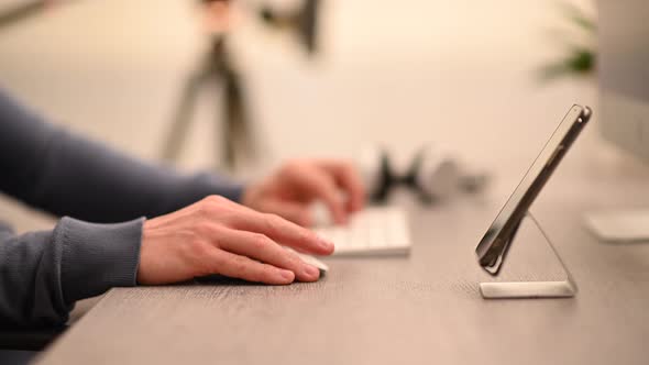 Caucasian Home Office Worker in Front of His Computer alt