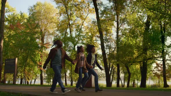 African American Family Walk Autumn Park Together alt