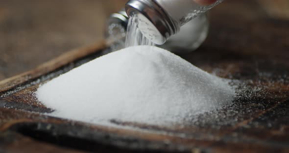 Salt Is Poured on the Cutting Board alt