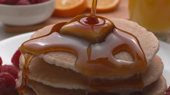Syrup pouring onto stack of pancakes in super slow motion, shot on Phantom Flex 4K alt