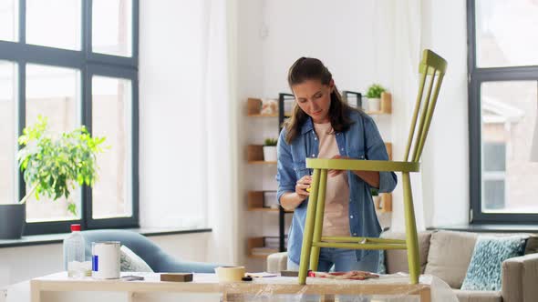 Woman with Ruler Measuring Chair for Renovation alt