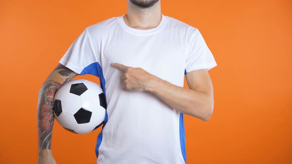Man in Blank Football Shirts Pointing Advertise alt