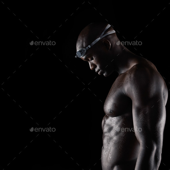 Strong male swimmer after training session - Stock Photo - Images