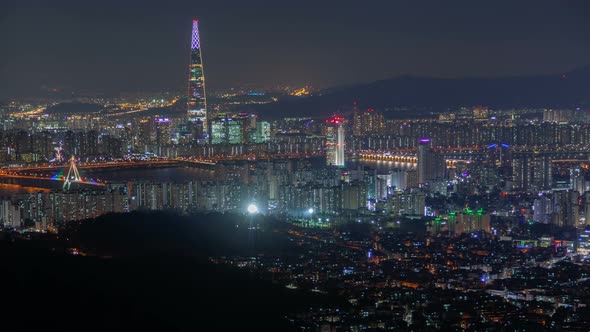 Timelapse Seoul Buildings at Famous Tower Reflected in Water alt