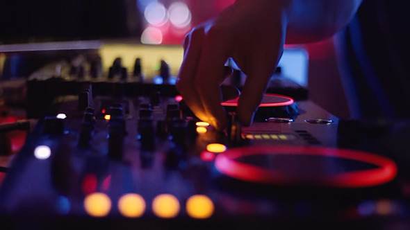 DJ Mixer in Night Club