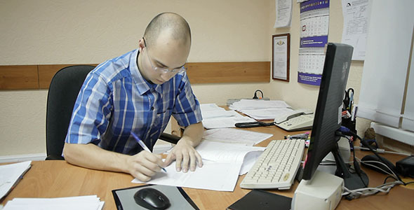 Office Worker Signing Documents alt