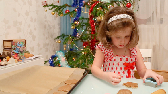 Little Girl Baking Christmas Cookies alt