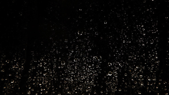 Water Drops Background On Glas In Night