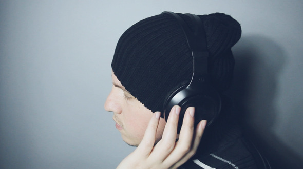 Man In Headphones Listening To Music