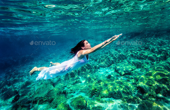 Refreshing swimming underwater - Stock Photo - Images