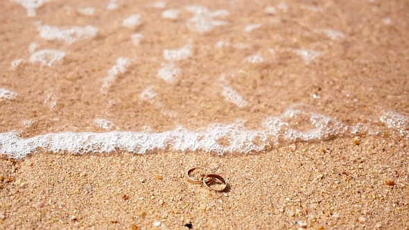 Wedding Rings in Sea Waves, Stock Footage | VideoHive