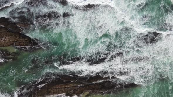 Waves Crashing Into Rocks Seen Midocean