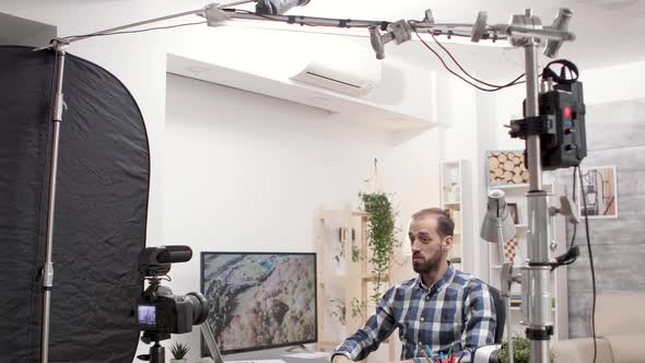 Behind the Scenes of Vlogger Recording New Episode for Subscribers alt