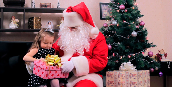 Santa Claus Gives A Gift 1