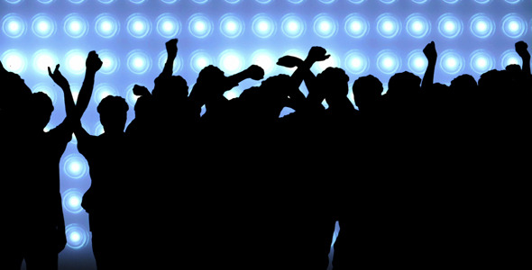 A Group of People Amid Flood Lights alt