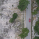 Above a Car in Mountainous Landscape - VideoHive Item for Sale
