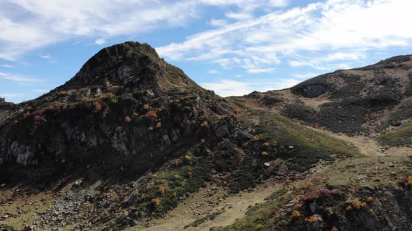 Drone Take Off Over the Mountains Flight Over Autumn Mountain with Forest Soft Light alt